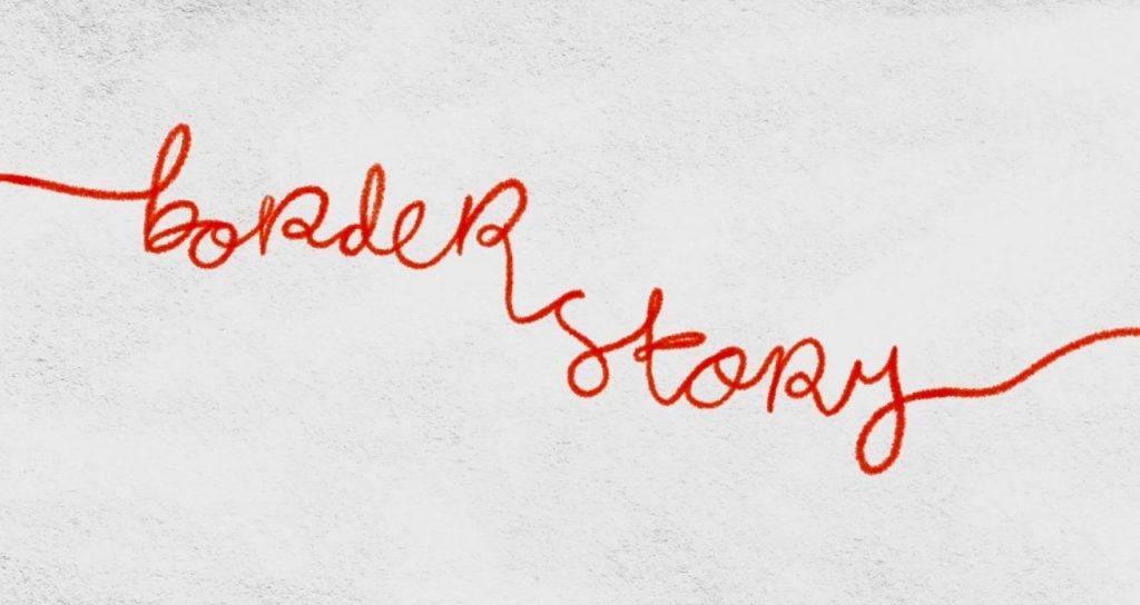 "borderstory" in cursive written with red crayon against a grey mottled background