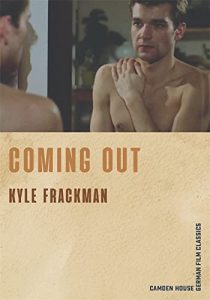Matthias Freihof as the character Philipp in ‘Coming Out’, looking at his reflection in a mirror, reaching across his chest to hold his shoulder. This is the main image for the book Coming Out by Kyle Frackman, published by Camden House, German Film Classics.