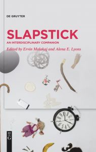 An array of props from bird's eye view against a light grey background, including a bent pencil, twin bell alarm clock, doll with braided hair and pink-and-white overalls, banana, and more. This is the background image for the book Slapstick: An Interdisciplinary Companion, edited by Ervin Malakaj and Alena E. Lyons, published by De Gruyter.